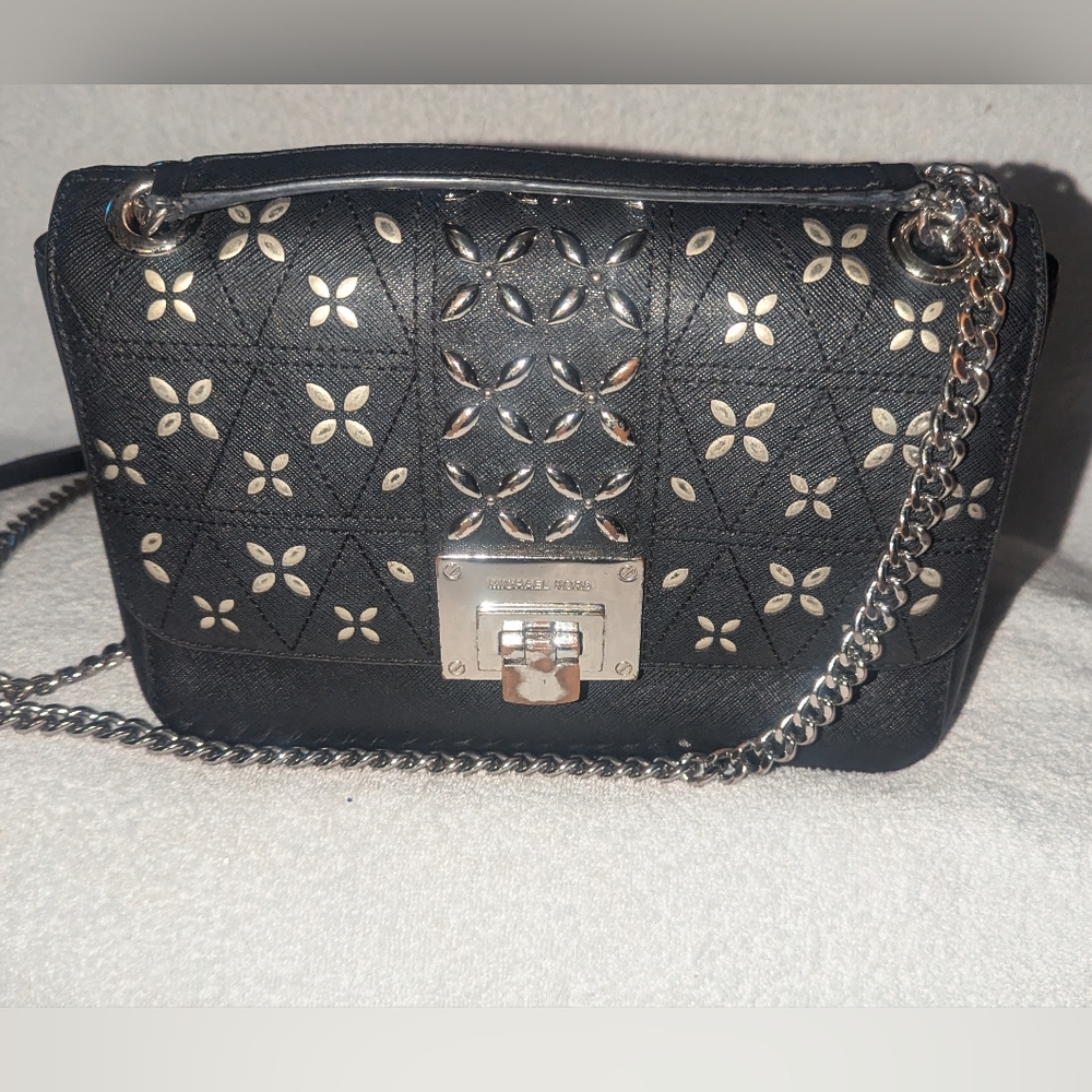 Michael Kors medium Tina black saffiano leather shoulder crossbody bag.